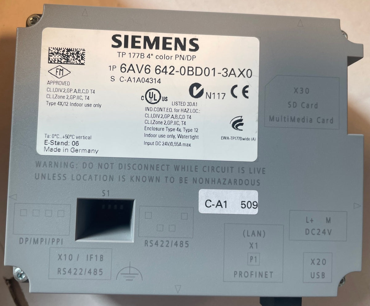 A Siemens TP 177B 4" color PNVD industrial SD card module on a gray metal surface, showing the front panel with labels, connectors, and a white product sticker.