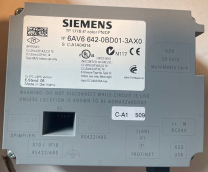 A Siemens TP 177B 4" color PNVD industrial SD card module on a gray metal surface, showing the front panel with labels, connectors, and a white product sticker.