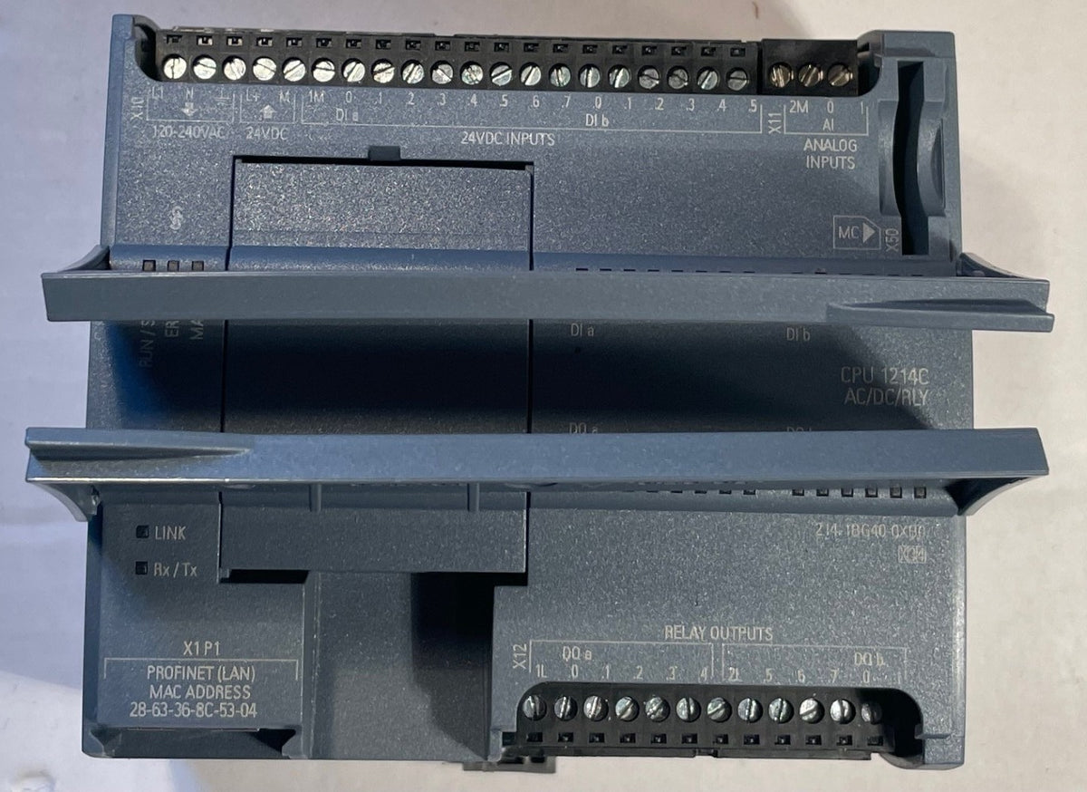 A Siemens S7 PLC modular relay module, model 6ES7 1214CG 0AB0, showing the front and back terminal strips on a light gray background.