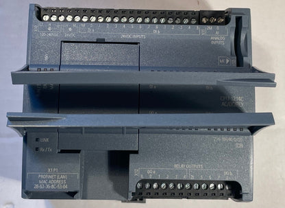 A Siemens S7 PLC modular relay module, model 6ES7 1214CG 0AB0, showing the front and back terminal strips on a light gray background.