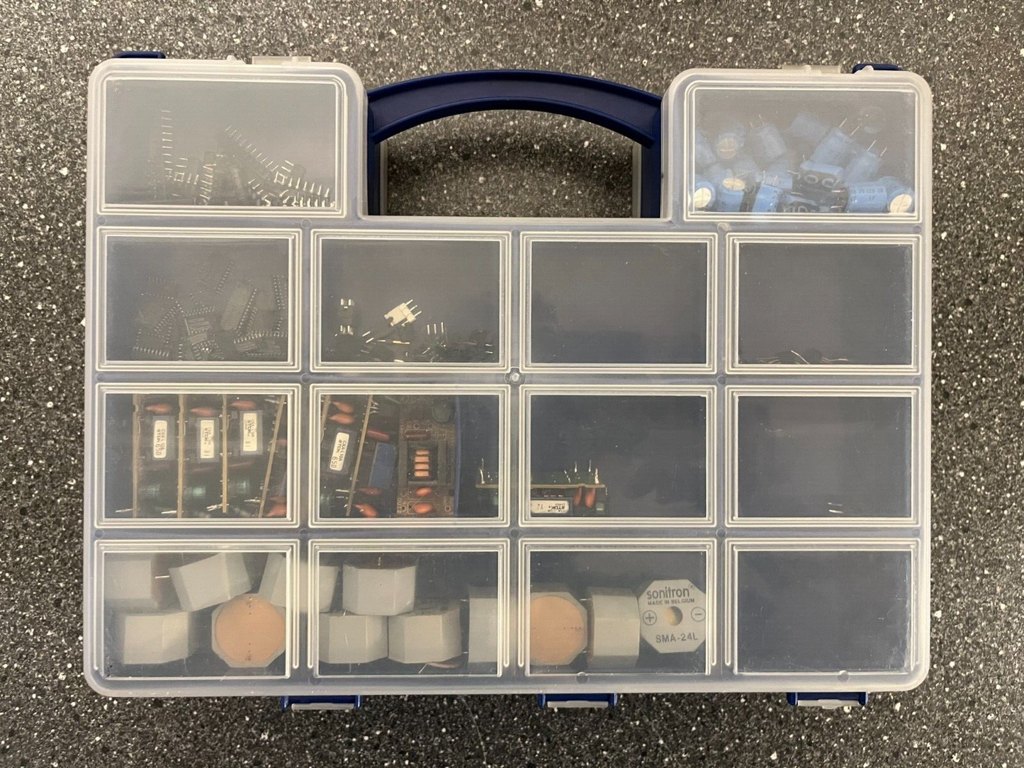 Double-Sided Organizer Box with Assorted Capacitors, IC Chips, and Electronics