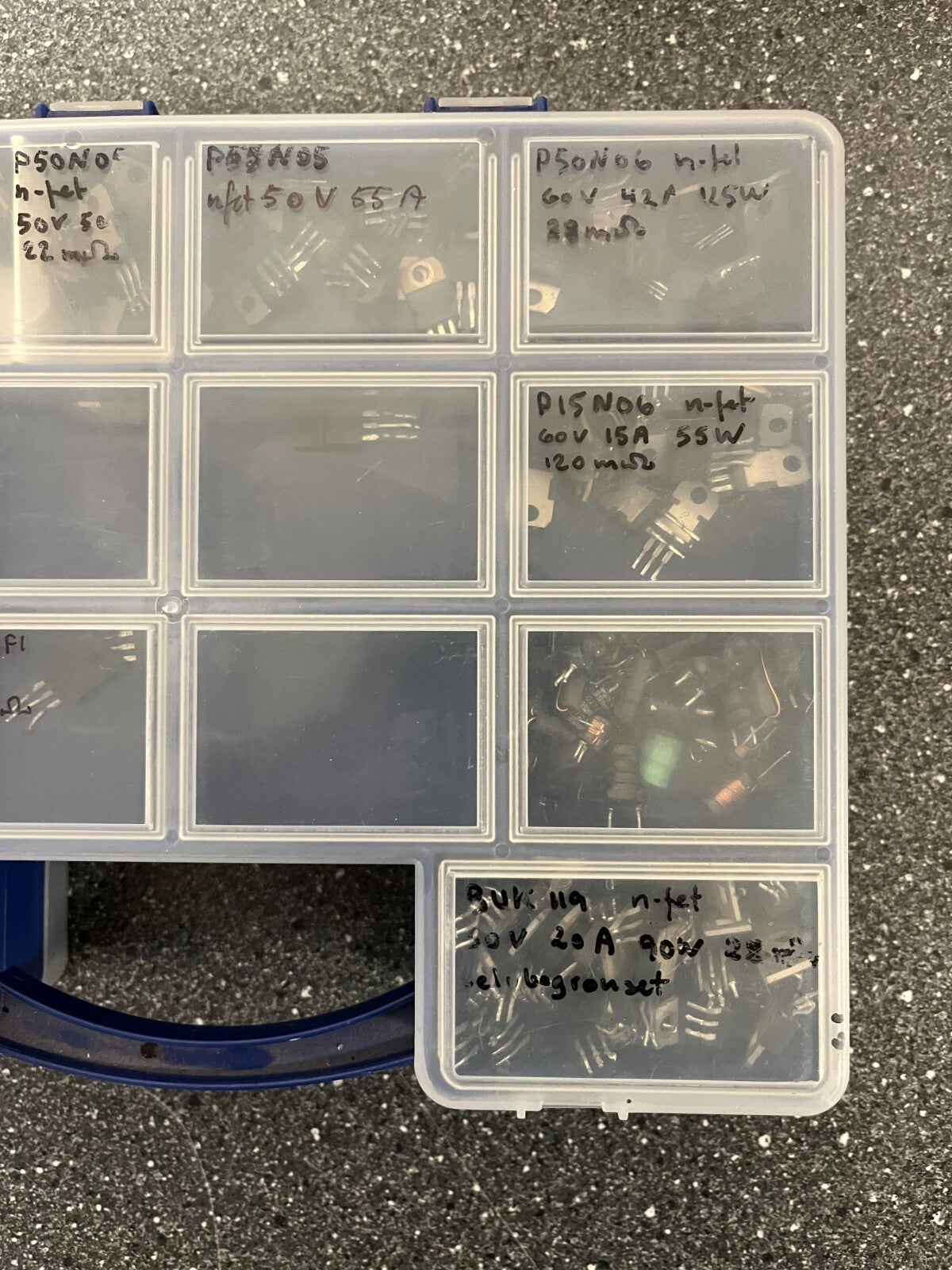 Double-Sided Organizer Box with Assorted Capacitors, IC Chips, and Electronics