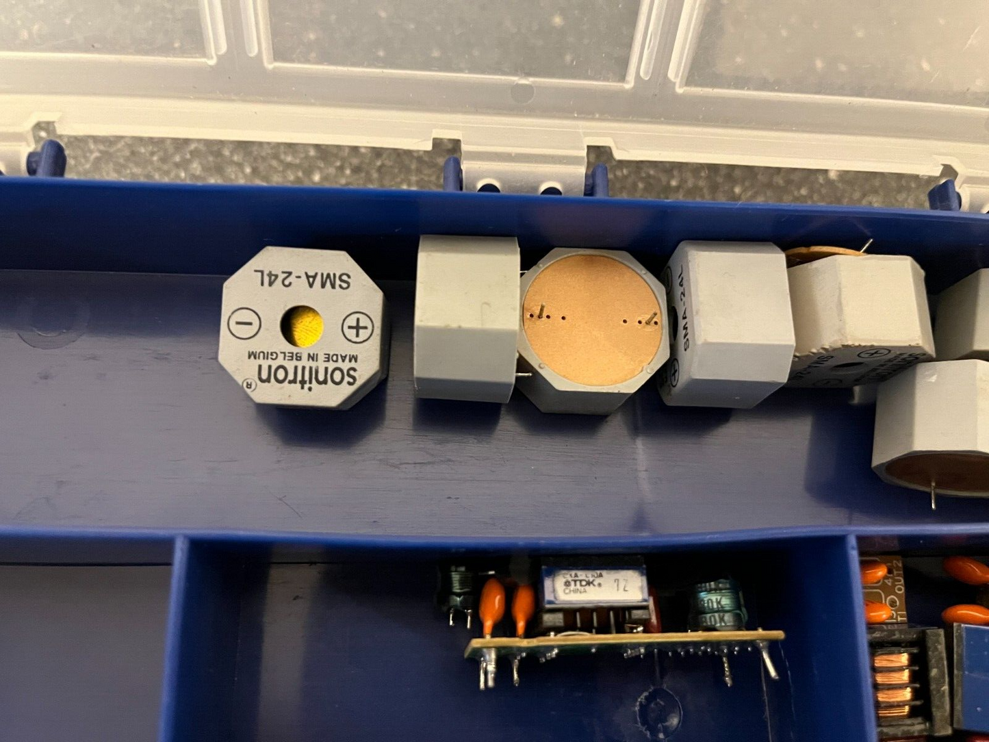 Double-Sided Organizer Box with Assorted Capacitors, IC Chips, and Electronics