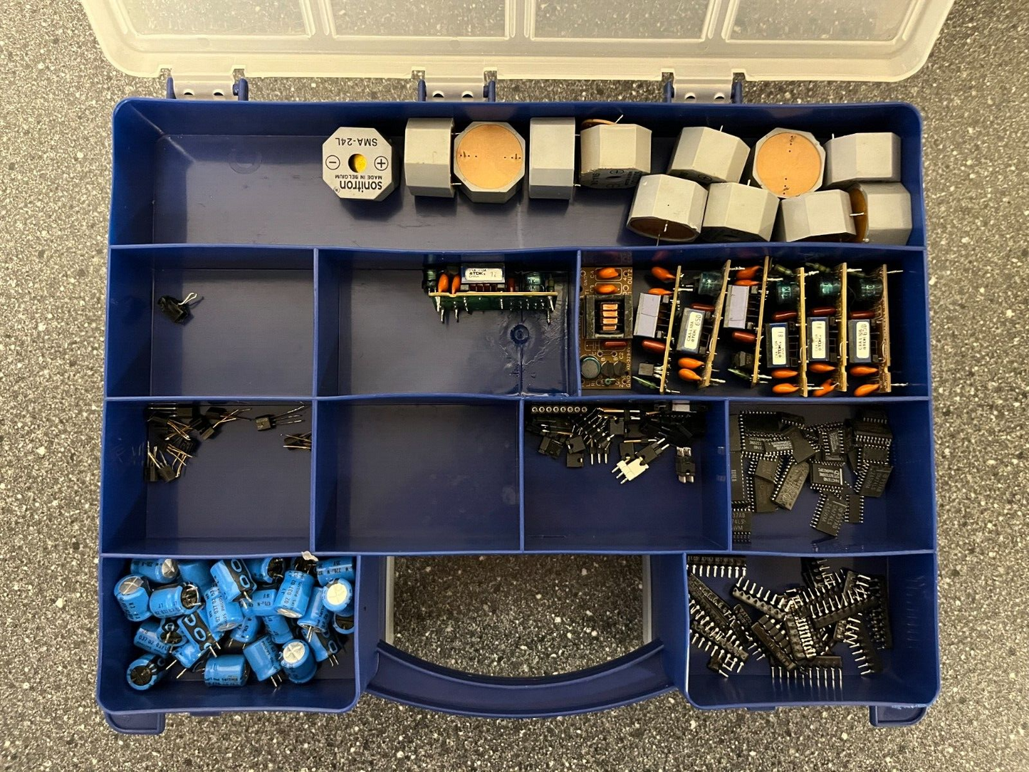 Double-Sided Organizer Box with Assorted Capacitors, IC Chips, and Electronics