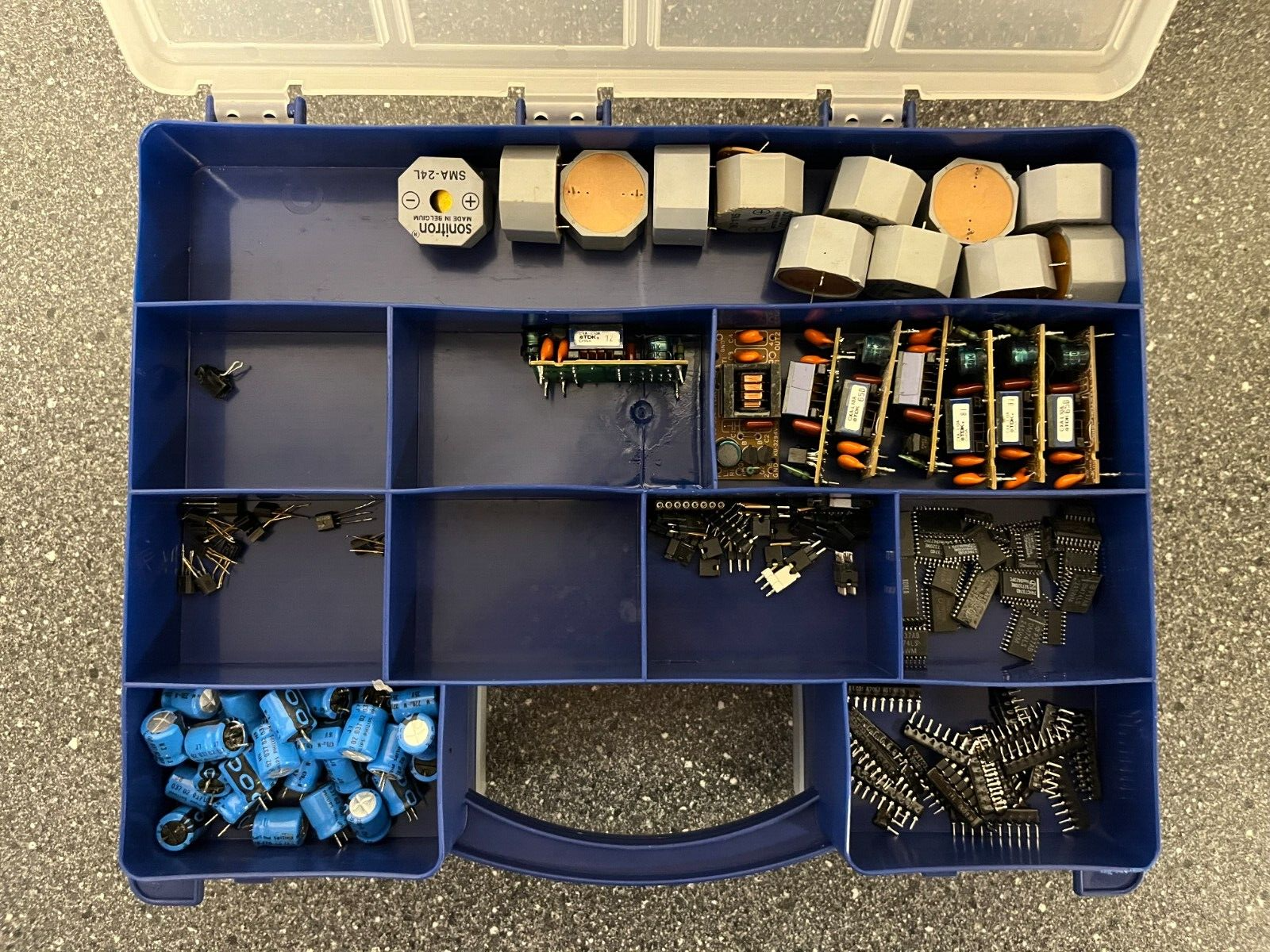 Double-Sided Organizer Box with Assorted Capacitors, IC Chips, and Electronics