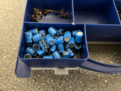 Double-Sided Organizer Box with Assorted Capacitors, IC Chips, and Electronics